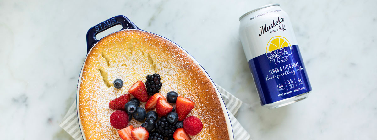 Pudding cake and can of Field Berry & Lemon Hard Sparkling Water